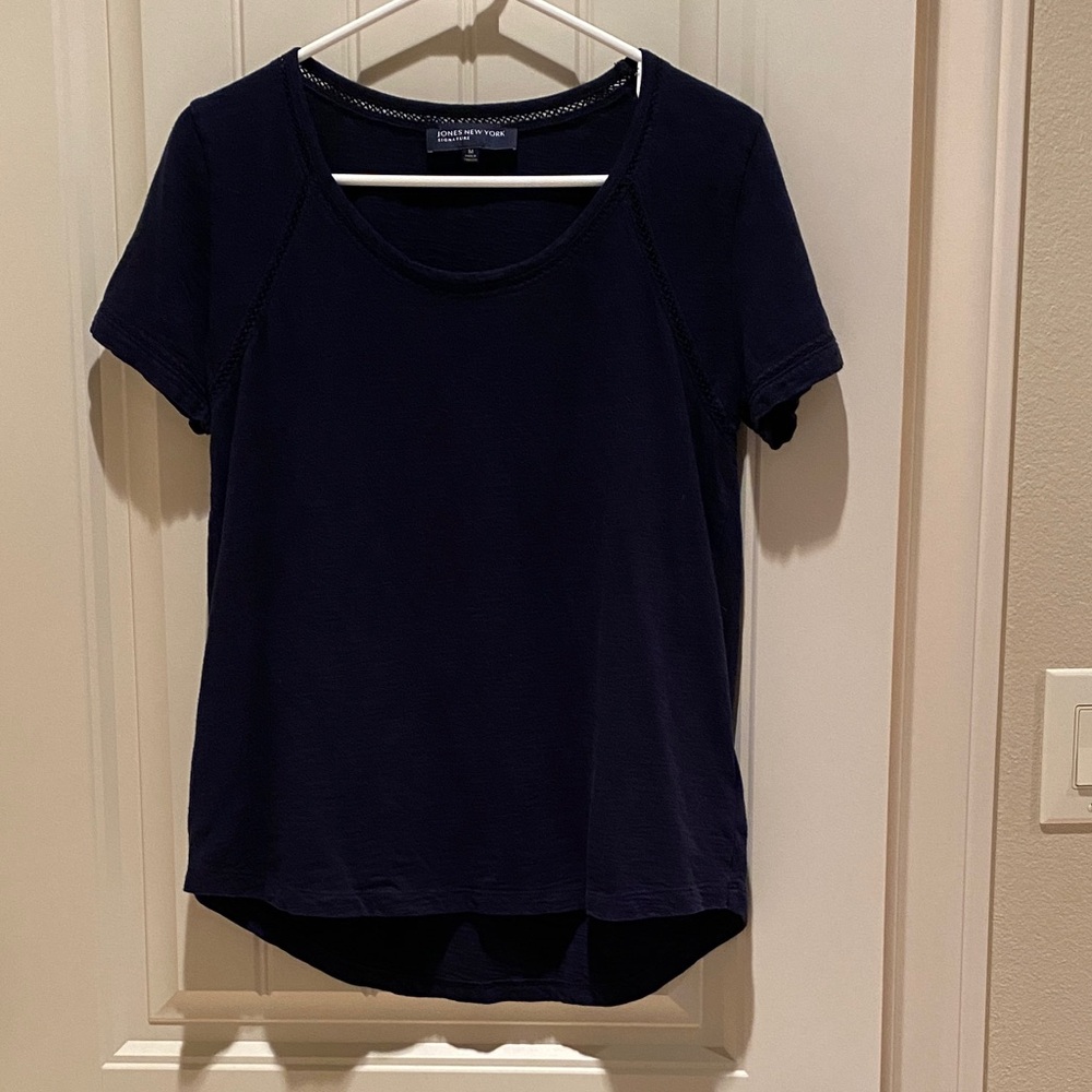 10/10$.  10 (4-5$) items for 10$. Jones New York T-Shirt with intricate detail .